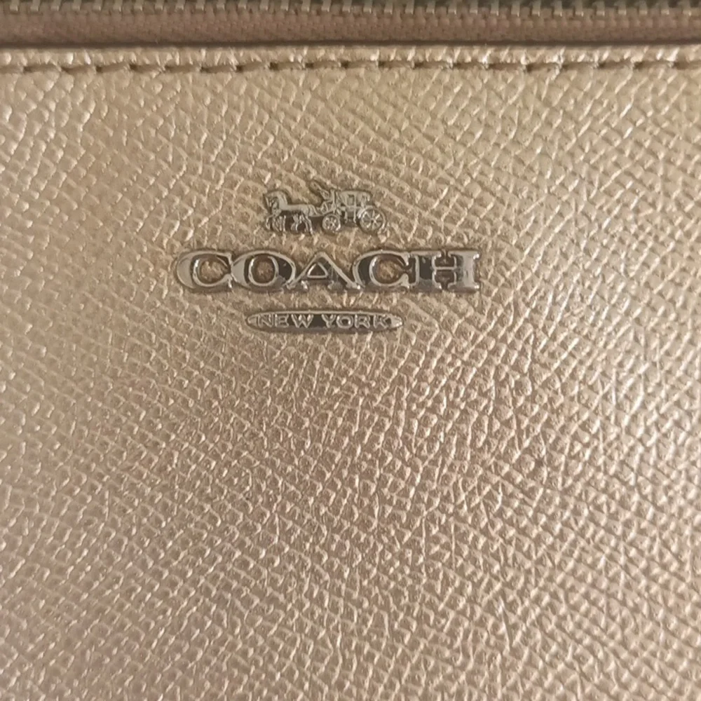 Coach vintage gold metallic shiny pebble grain leather wristlet